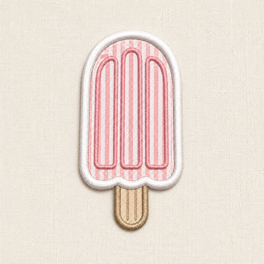 A close-up of a popsicle shaped embroidered patch. In the center is a popsicle, set against a background of alternating horizontal stripes similar to seersucker. The entire patch is enclosed by a clean, raised white merrowed border.

Embroidered patch of a pink striped popsicle on a beige fabric background