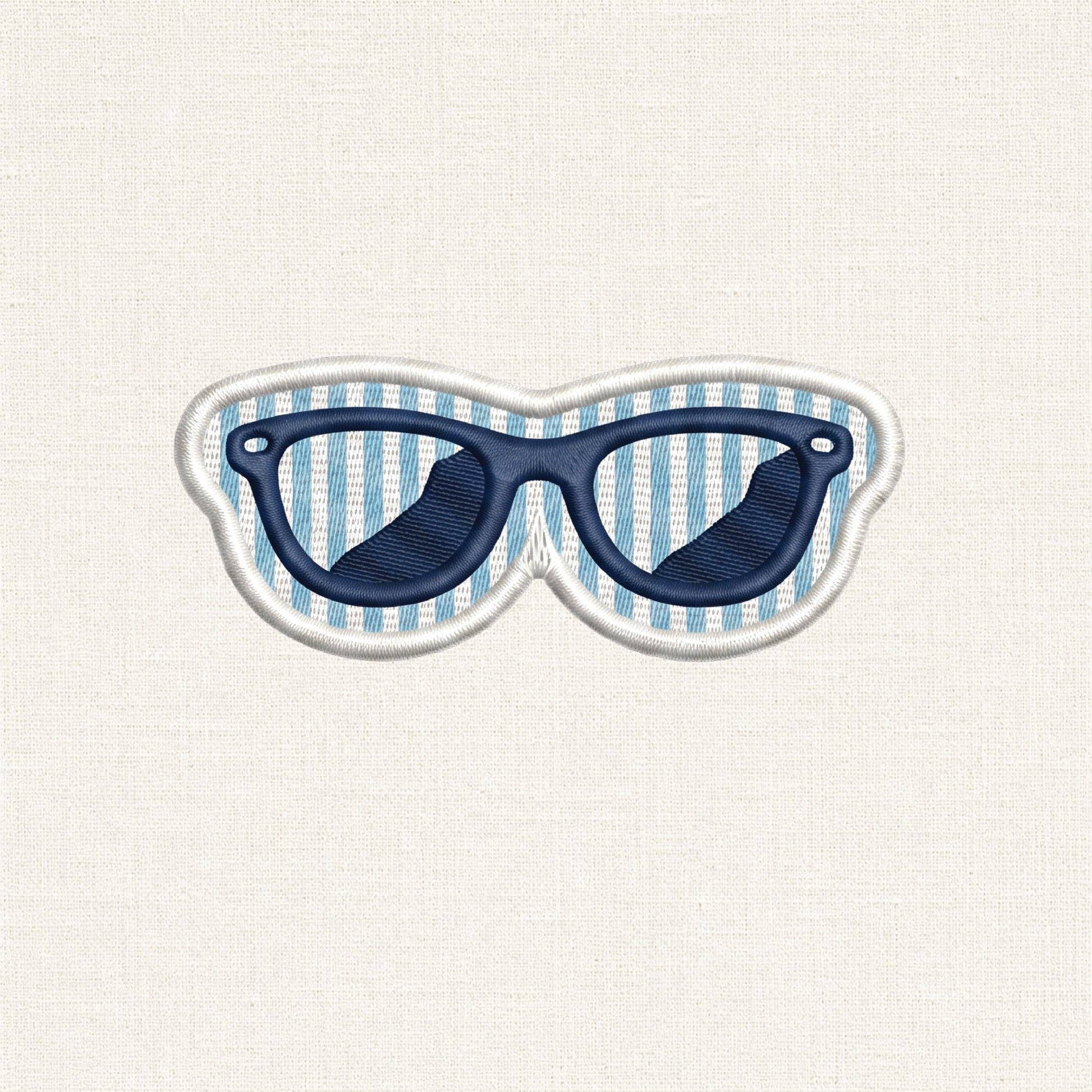 A close-up of a sunglass shaped embroidered patch. In the center is a detailed pair of sunglasses, set against a background of alternating horizontal stripes similar to seersucker. The entire patch is enclosed by a clean, raised white merrowed border.